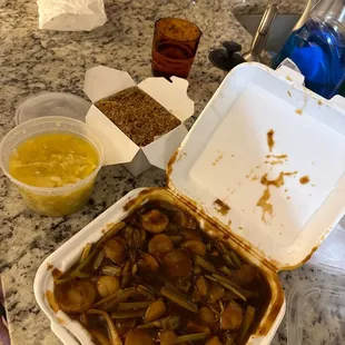 the contents of a meal in a takeout box