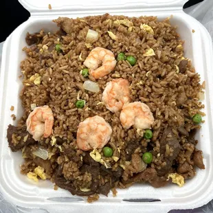 The fried rice is drenched with soy sauce.  The beef is very gristly and I have to spit it out every time