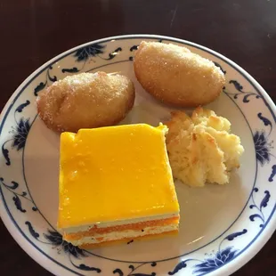 Dessert plate from buffet. Orange cake was so good! Chinese donuts and coconut drop were also very good