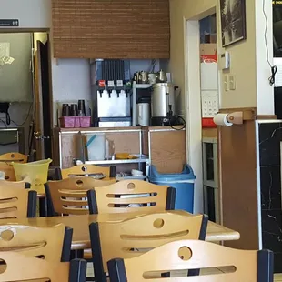 empty tables and chairs in a restaurant