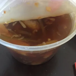 Two small Hot and Sour soups going into the garbage.... I am 51 years old and can honestly say I have never had bad soup. Amazing!!!!!