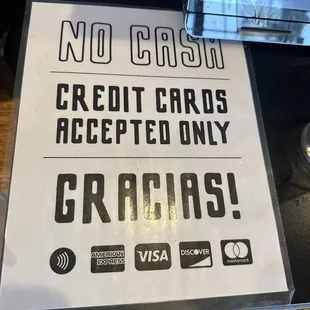 And we wonder why Americans are billions of dollars in credit card debt. This sign is not forcing you use a credit card but still