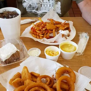 Fish nuggets, onion rings,  mac n cheese,  mashed potatoes, corn fritters,  fried shrimps, fries &amp; sweet potato pie with marshmallow fluff.
