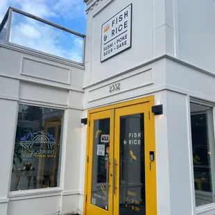 The bright yellow entrance which welcomes you in