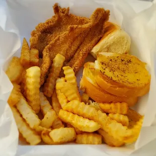 Lunch portion of sole w/fries and extra order of garlic bread...delicious
