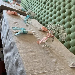 a table set for a baby&apos;s breath