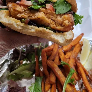 Salmon burger with sweet potato fries.
