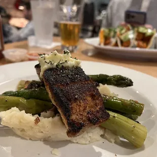 Black and red fish with blue cheese butter