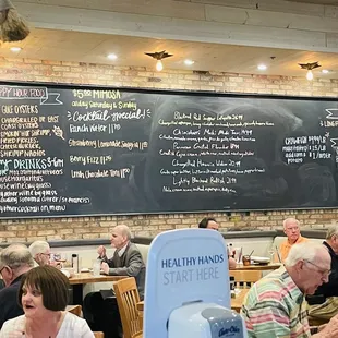 people eating and drinking