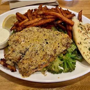 Atlantic Salmon (Cajun style) with sweet potato fries and sautéed veggies