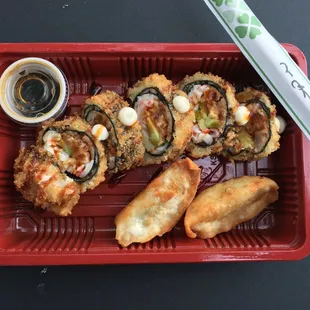 M-16 Box Spicy tuna, crab, and avocado panko fried and topped with garlic mayo and eel sauce...Yum!! + 2 Gyoza!