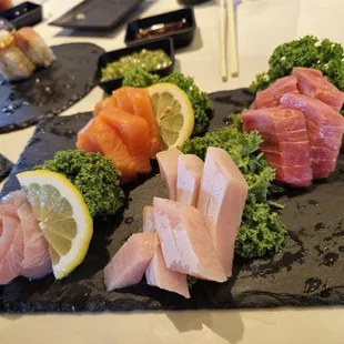 Salmon, yellowtail, fatty bluefin, and amber jack sashimi