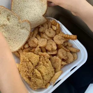 Shrimp and French fries, added a piece of catfish
