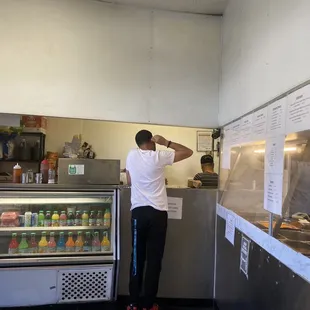 a man standing at the counter