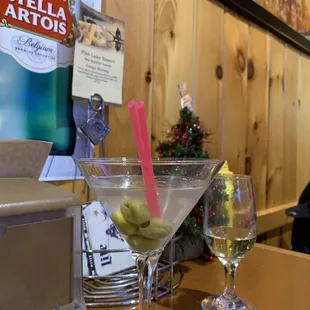 a martini and a bottle of stella artois