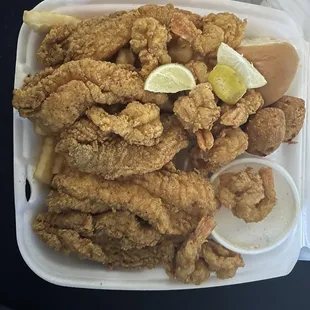 Look at my plate 5 fish and 10 shrimps , fries , potato salad , hush puppies..  I am happy right now