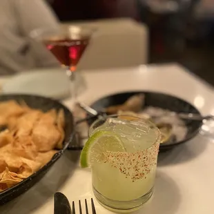 a plate of chips and a drink