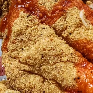 doused on spicy Cajun sauce