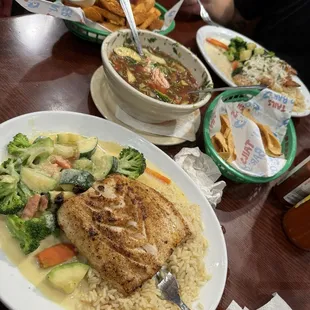 Pineapple Mahi Mahi, Aguachile, fries, and grilled shrimp &amp; scallops.