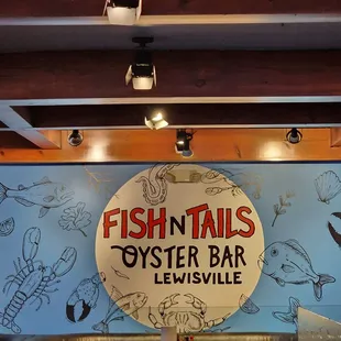 a fish and oyster sign