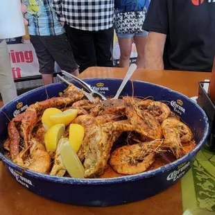 1/2 pound crab legs, $15., not worth it, tiny!! 1 lb shrimp, medium heat, large &amp; delicious!!