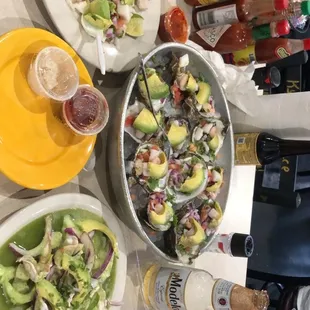Aguachiles verdes, prepared oysters, ceviche &amp; micheladas