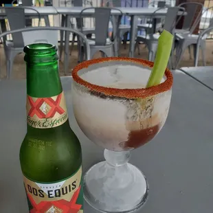 a margarita and a bottle of beer