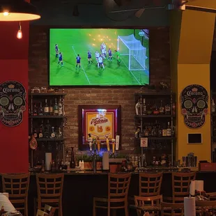 Full bar, many big screens