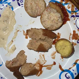 Artificial crab meat, in the crab ball and in the stuffed shrimp. The hush Puppie was freezer burnt