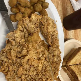 Chicken fried steak with fried okra and a side of Texas toast