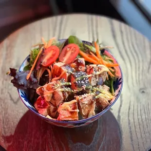 a salad in a bowl on a table