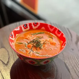 a bowl of soup on a table