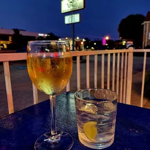 a glass of wine and a glass of lemonade
