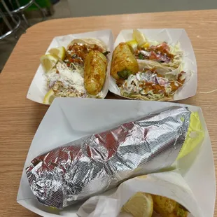 Shrimp burrito,Fish tacos and one potato taco.