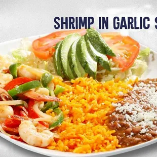 shrimp in garlic sauce with rice and vegetables