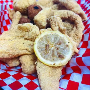 Fried catfish comes with hush puppies and fries