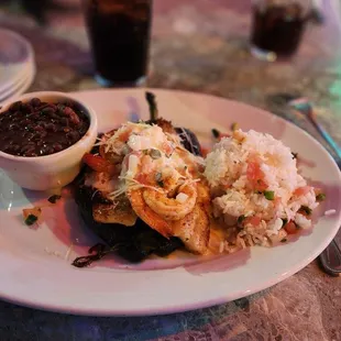 Tilapia &amp; Crab Stuffed Poblano  Shrimp &amp; pepper jack cheese, lemon butter, pico de gallo, black beans, white rice