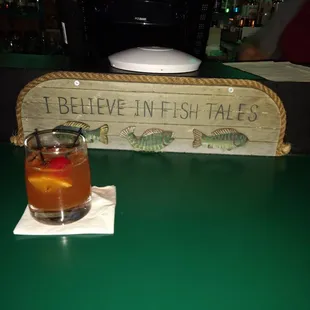 a drink and a sign