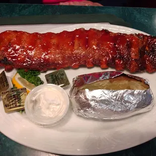 Spare Ribs: flavorful &amp; meaty: this is ONLY 1/2 a rack; a full rack is 2 of these; may be the best spare ribs in the area