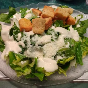 Caesar Salad: called "small", but a large plate full; served as 1 of your choices of veg.; marvelous dressing, really tasty
