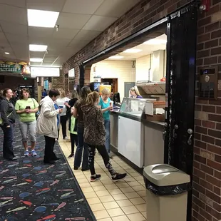 a group of people waiting in line