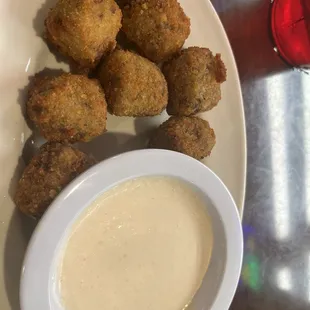 Boudin bits with Tiger sauce
