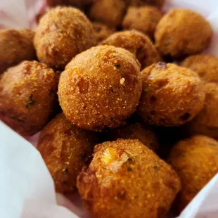 Shut up dogs (hushpuppies) served with honey. Beware- before you know it, you&apos;ve eaten like 5.