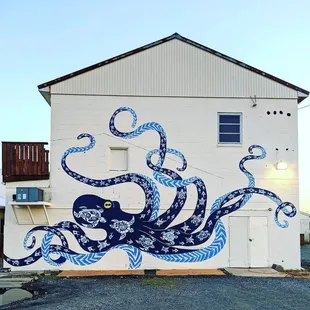 an octopus painted on the side of a building