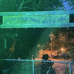 a sign that reads the good times rock roll