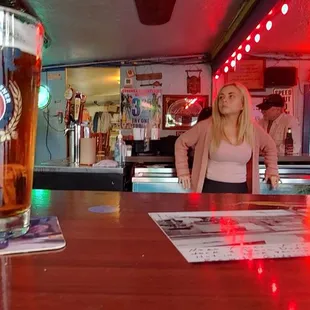 a pint of beer on the bar