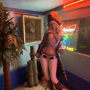 a woman with a neon sign