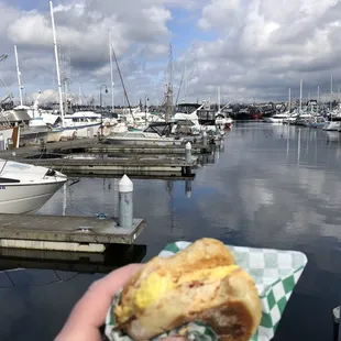 ... and look at the view! Walk out of the market, sit on a bench and enjoy your hot sandwich and coffee at Fishermen&apos;s Terminal!