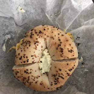 Garlic, jalapeño cream cheese, American cheese, egg, and sausage bagel!!