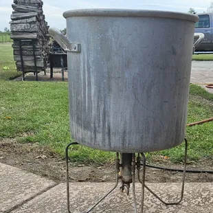 a large pot on a stand